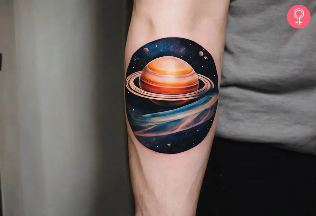 A Saturn planet tattoo on the arm