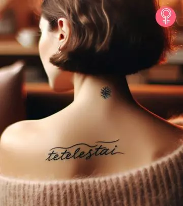 A piano tattoo on a woman’s upper arm