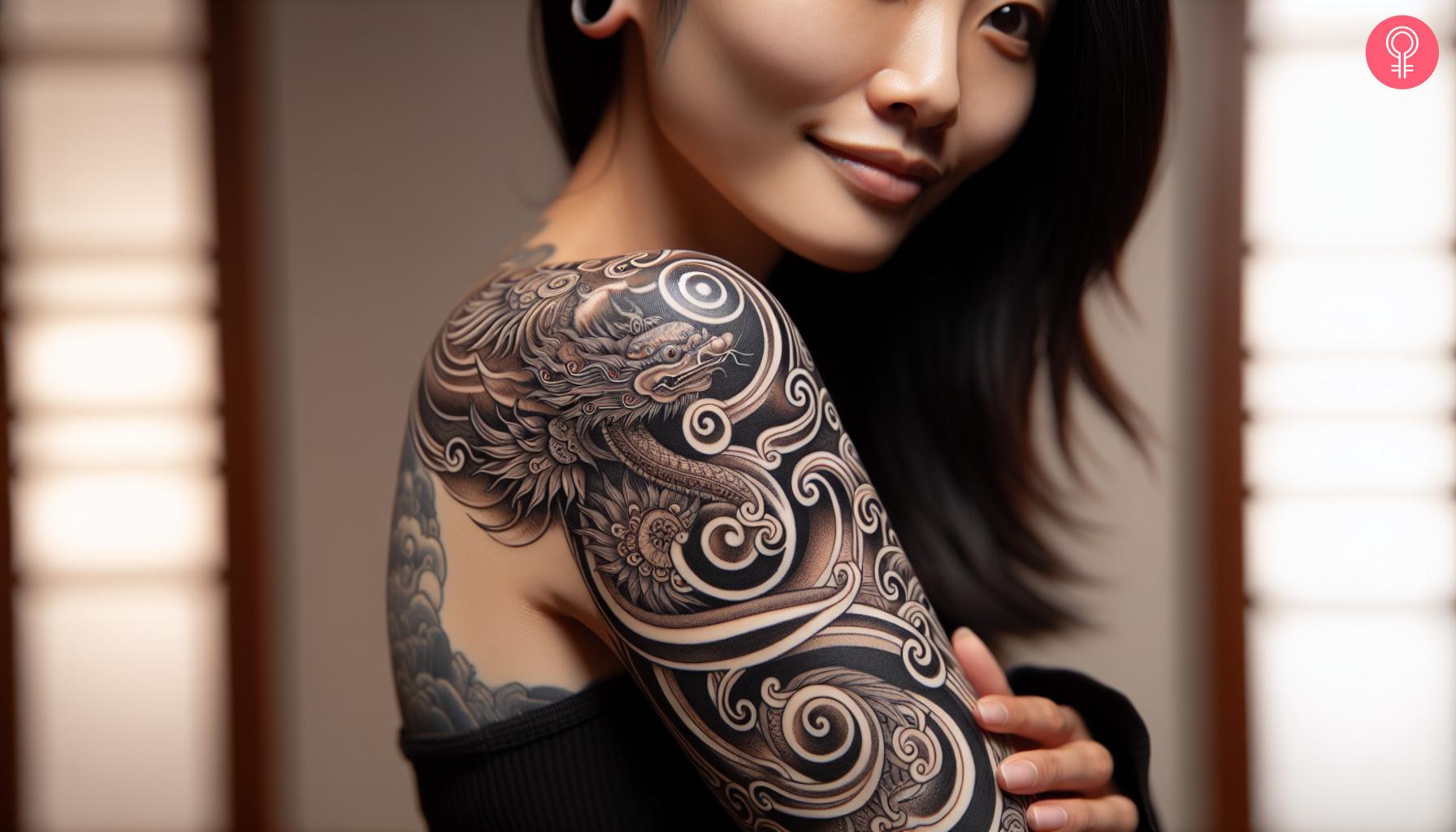 A Tibetan dragon tattoo on the upper arm