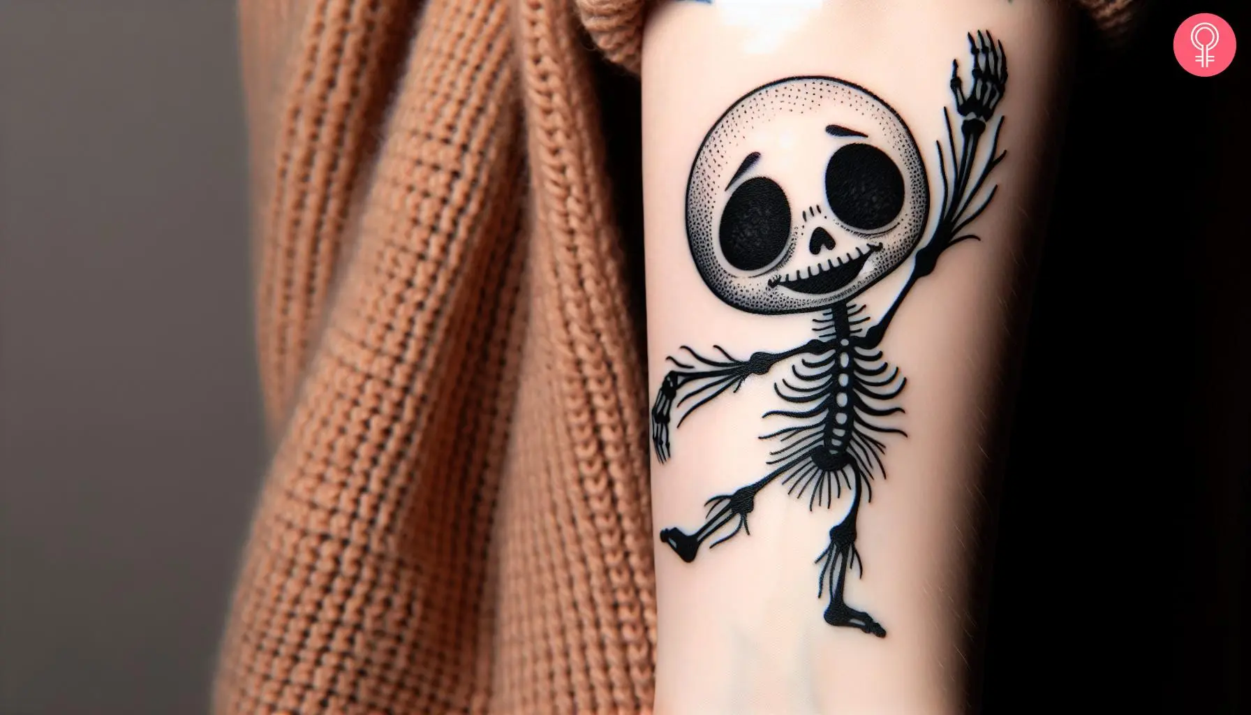 A baby Jack Skellington tattoo on the arm of a woman