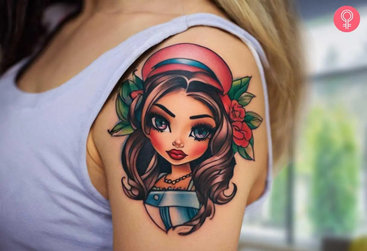 A colorful Yasmin tattoo on the shoulder cuff