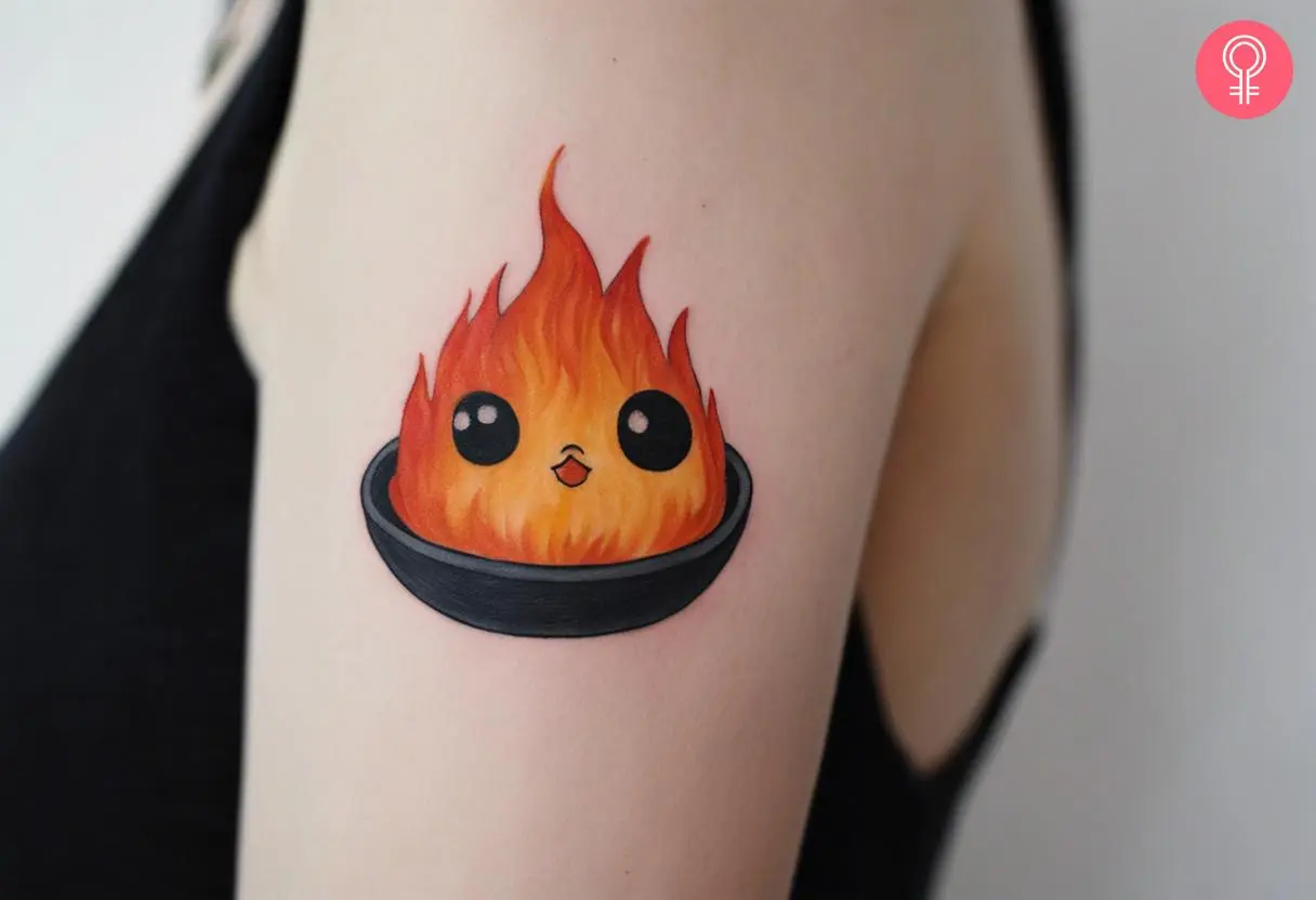 A cute Calcifer in a bowl tattoo