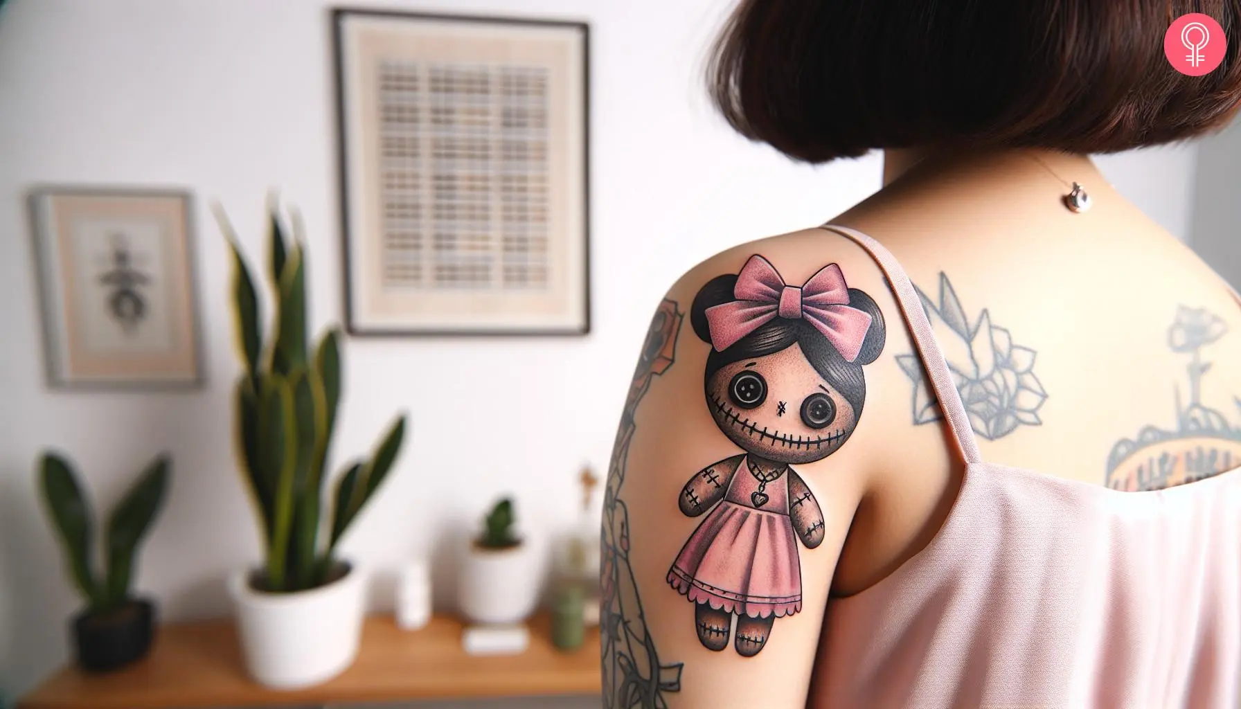 A cute voodoo doll on the back of the arm