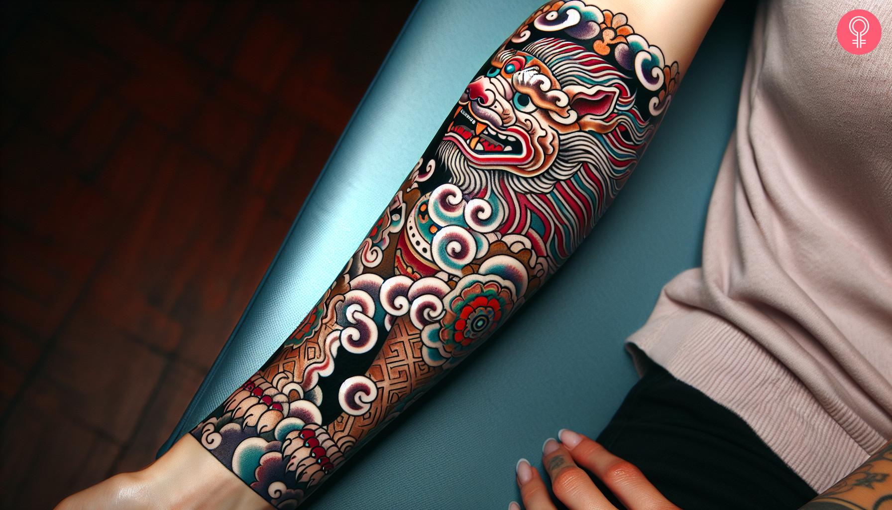 A forearm sleeve tattoo of a colorful snow lion