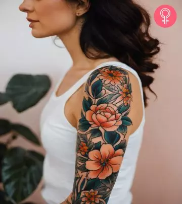 Woman with skull tattoo on her upper arm