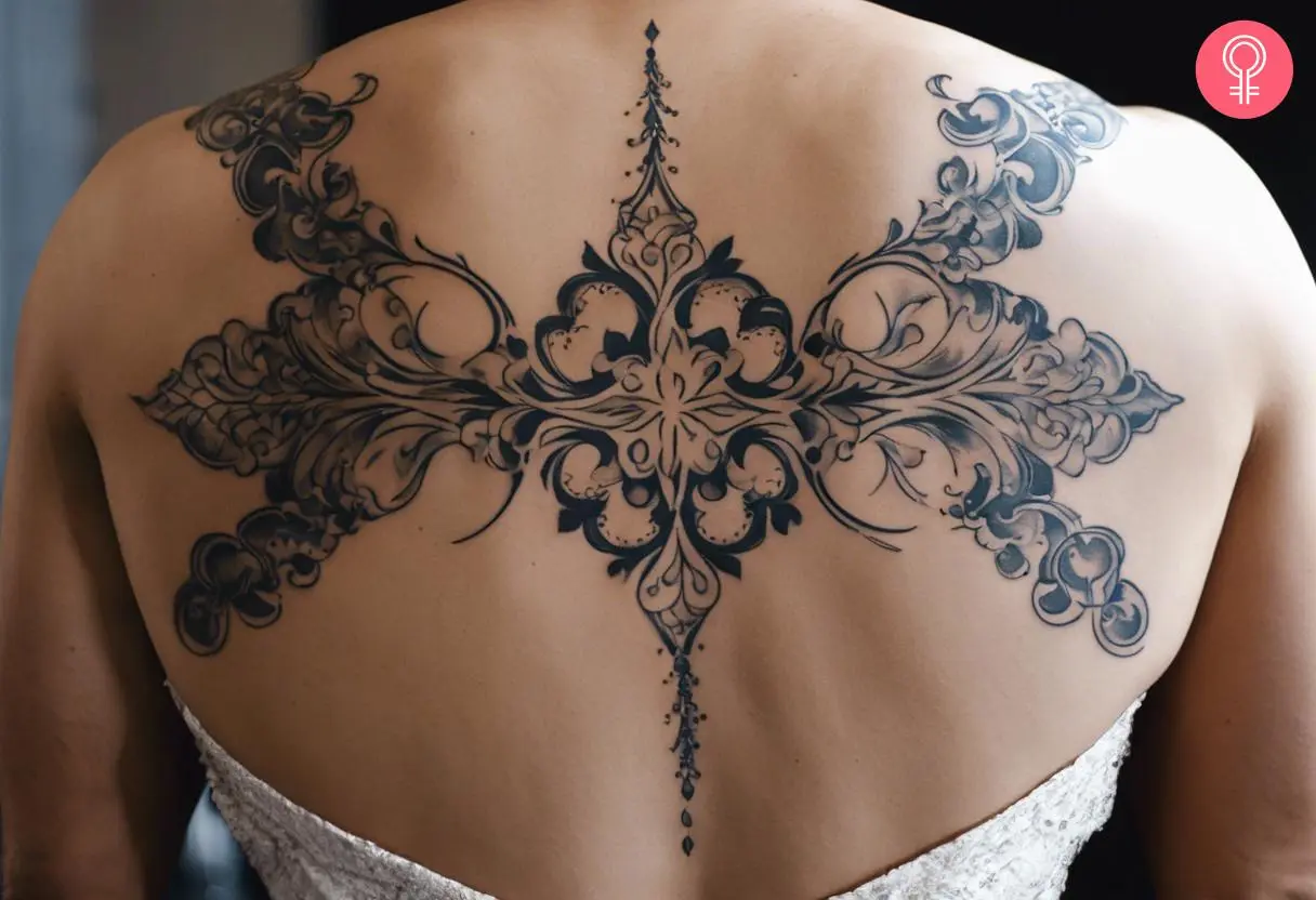 A geometric baroque tattoo on the back