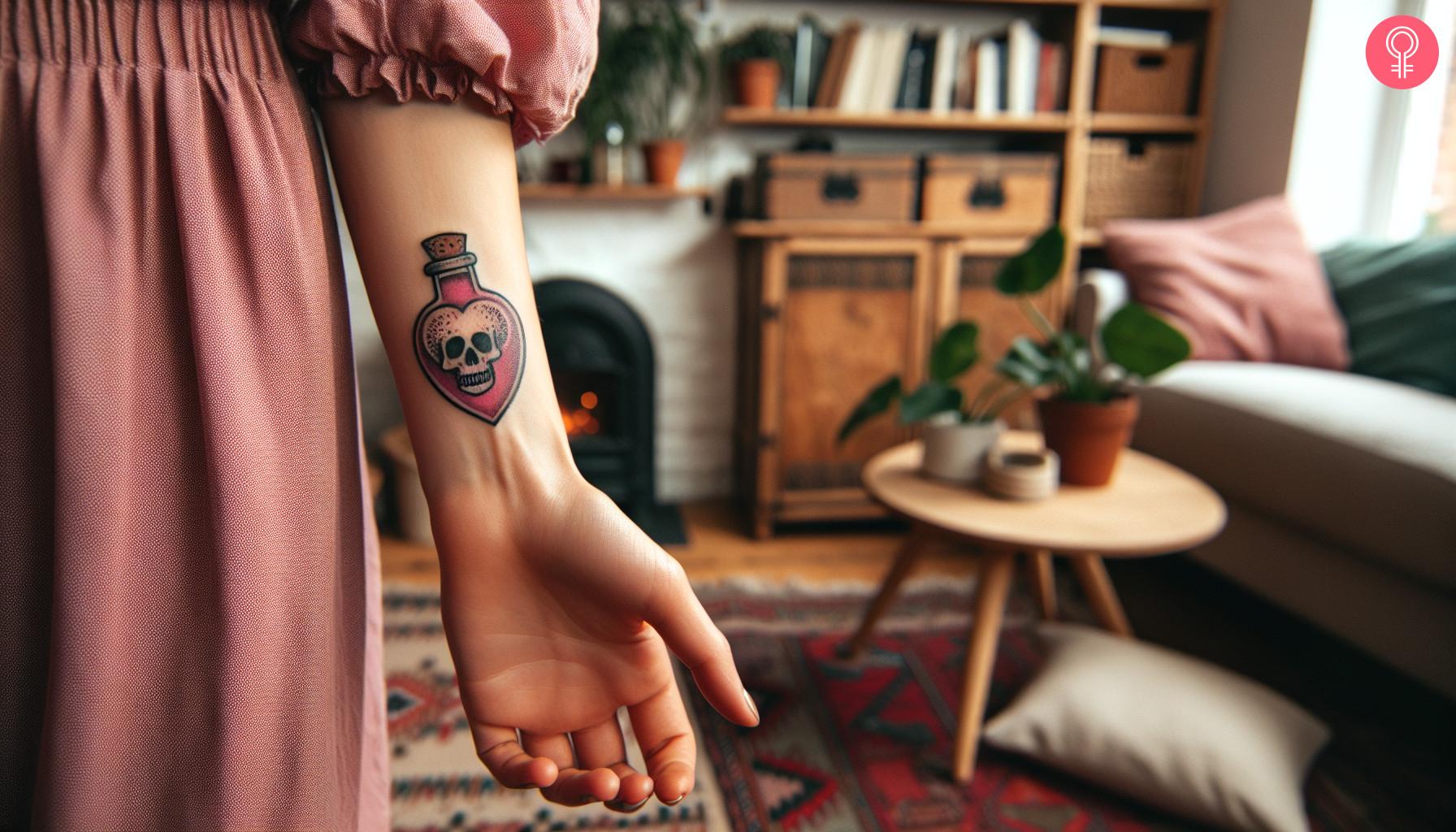 A girlish poison bottle tattoo on a woman's forearm