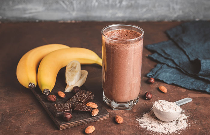 A glass of homemade almond and cocoa protein shake