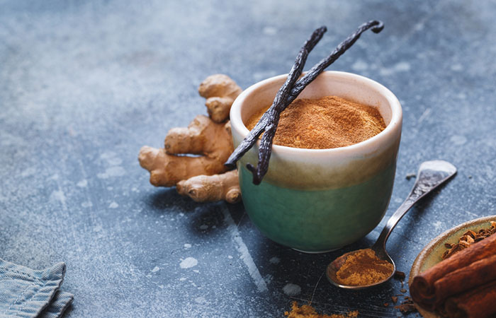 A glass of homemade vanilla chai protein shake on the table