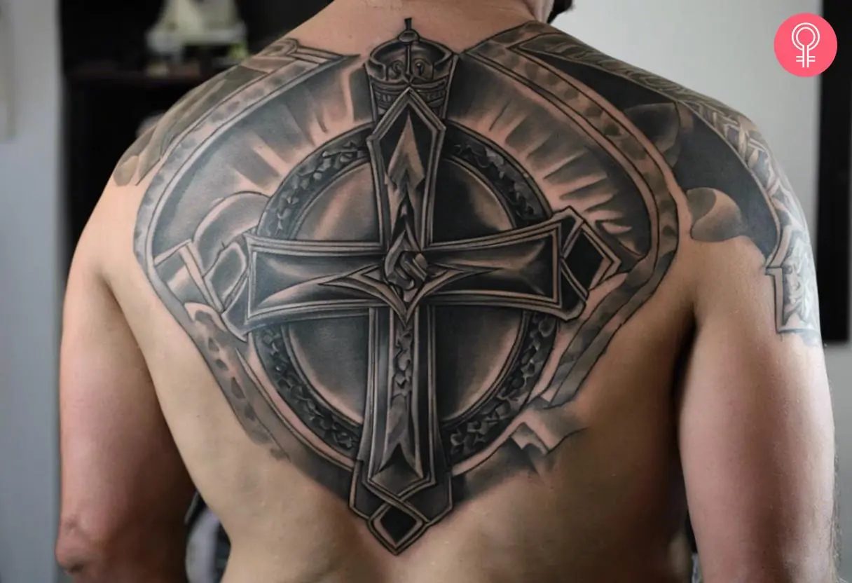 A large Cross back piece in black and grey ink