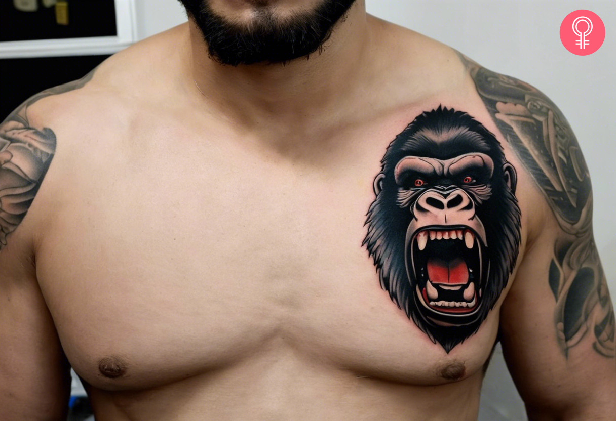 A man wearing a King Kong face tattoo on the front shoulder