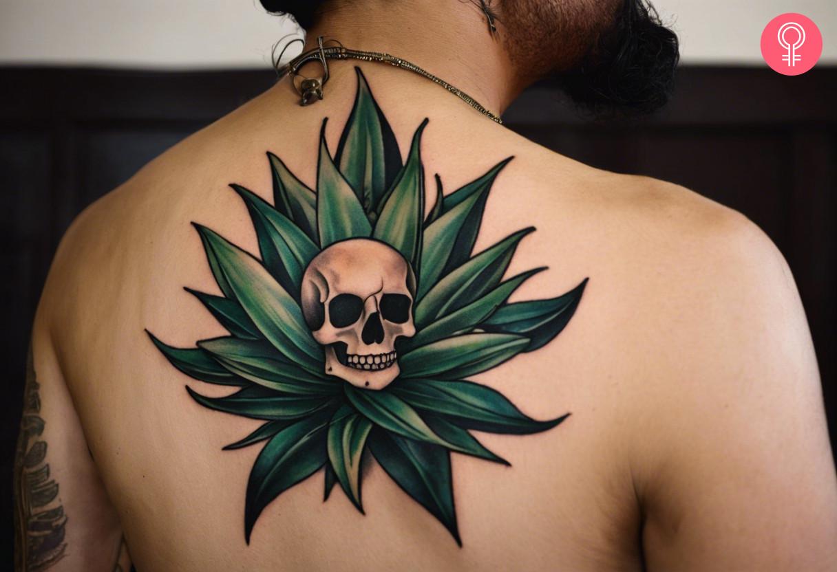 A man wearing a Mexican agave tattoo at the back.