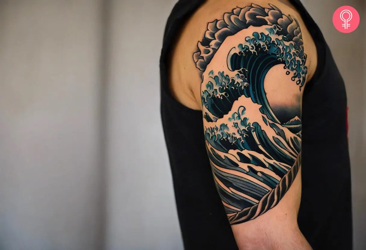 A man wearing a wave sleeve tattoo