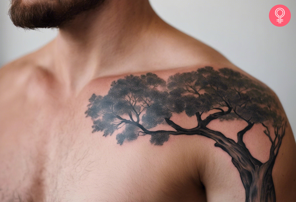 A man wearing an Australian eucalyptus tattoo on the shoulder