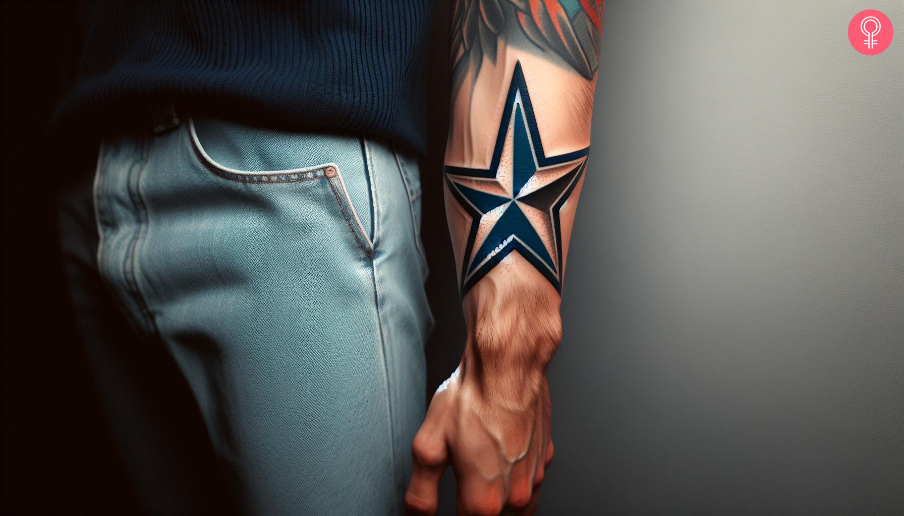 A man with a Dallas Cowboys tattoo on his forearm