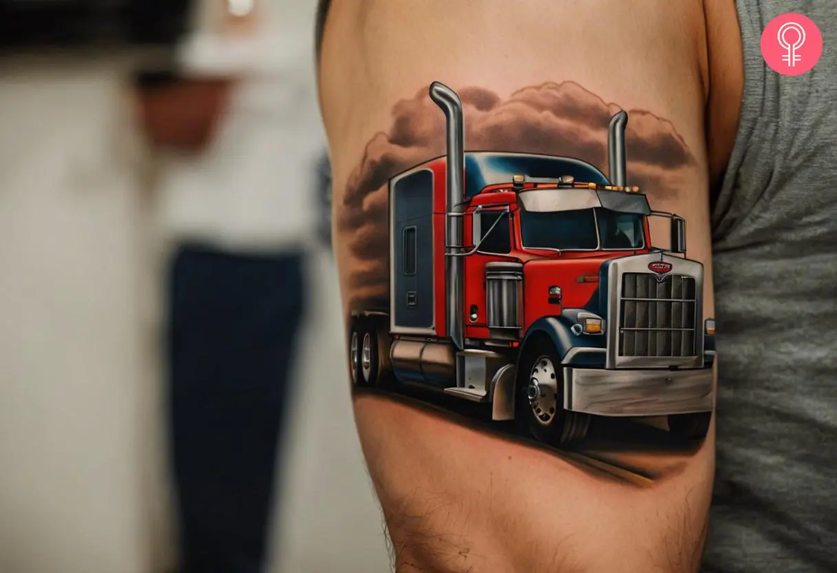 A man with a Peterbilt truck tattoo on his arm