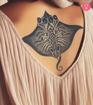 A manta ray tattoo on a woman’s back