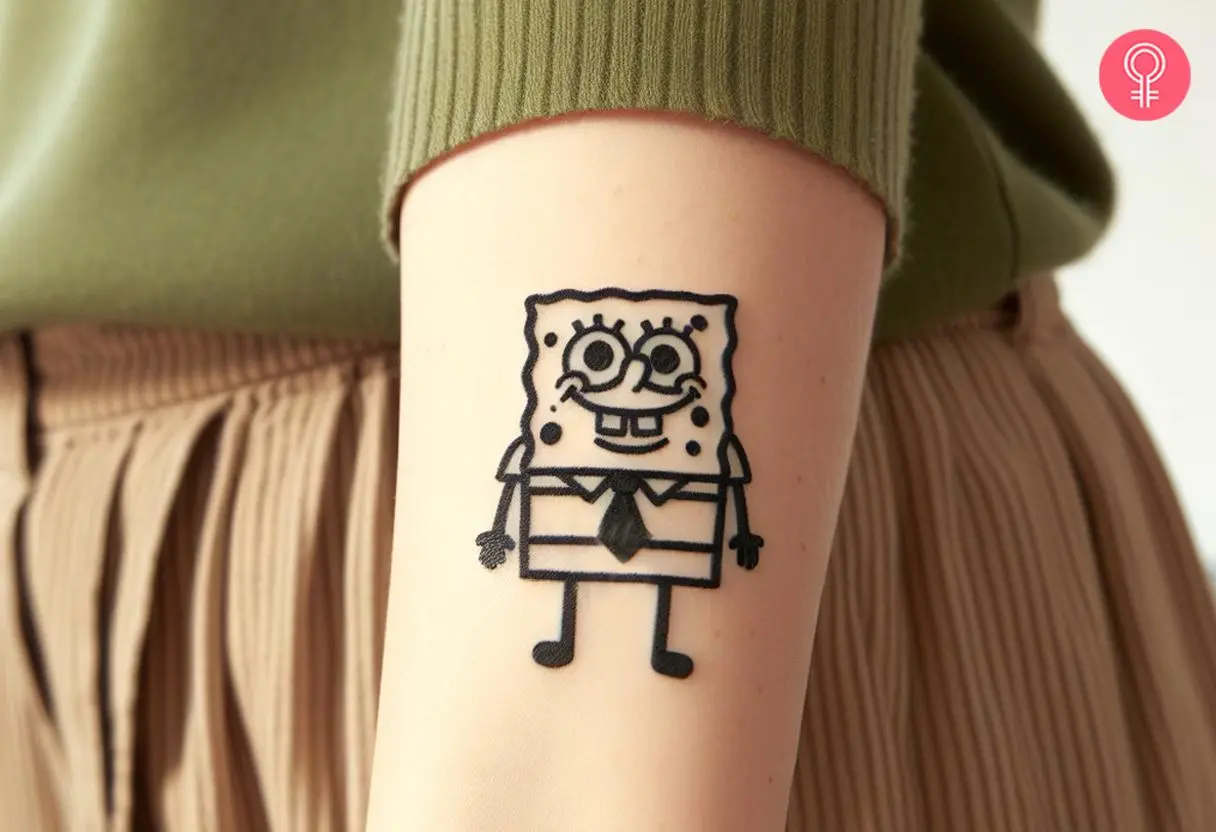 A minimalist spongebob tattoo on the lower arm