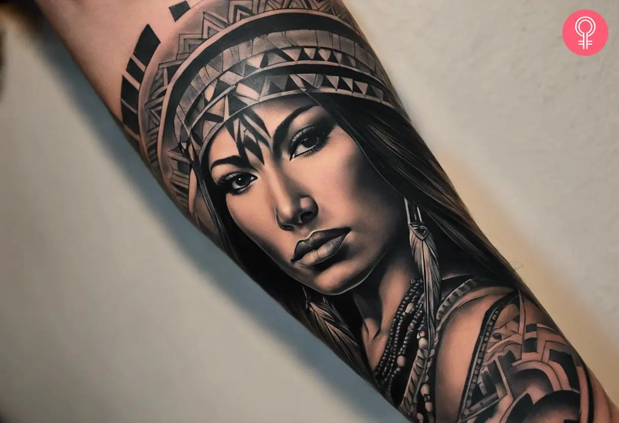 A navajo tattoo sleeve on the arm of a man