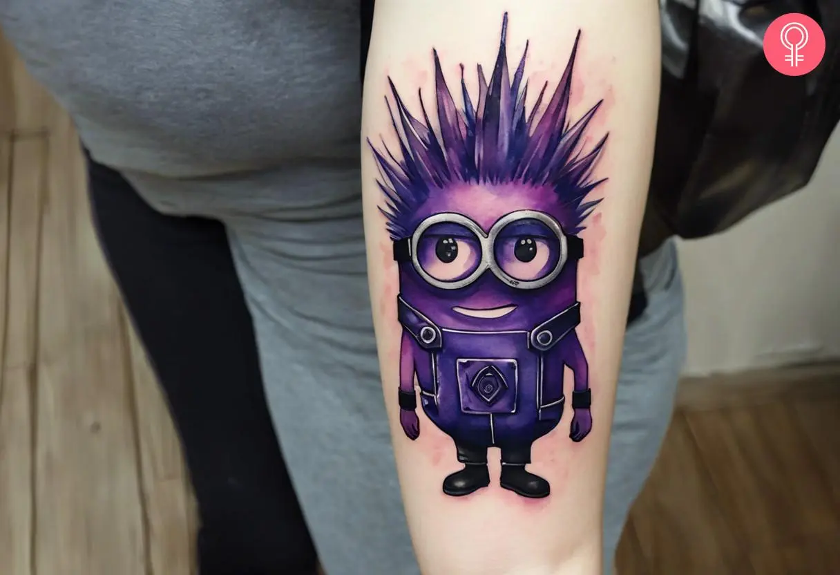 A purple minion tattoo on the forearm of a woman