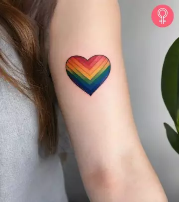 A woman sporting a heart locket tattoo