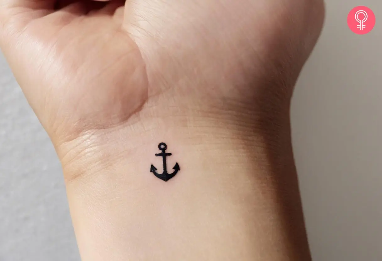 A small navy tattoo on a woman’s wrist