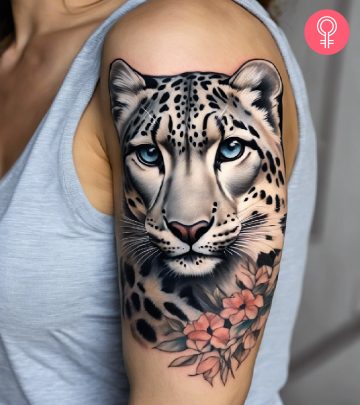 Close up of a leopard tattoo on a woman’s arm