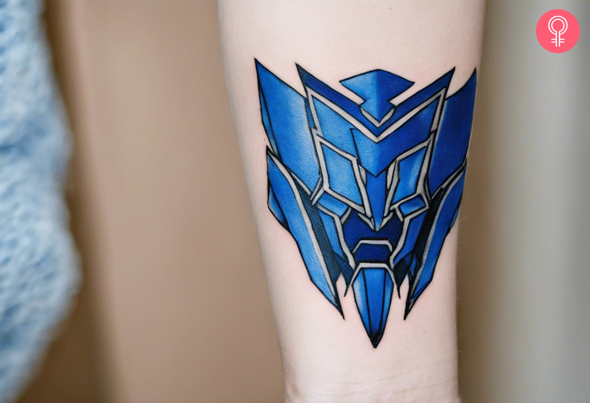 A striking blue soundwave tattoo on the forearm