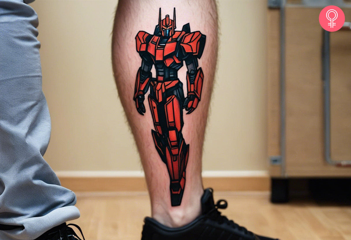 A tattoo of sentinel prime on the calf of a man