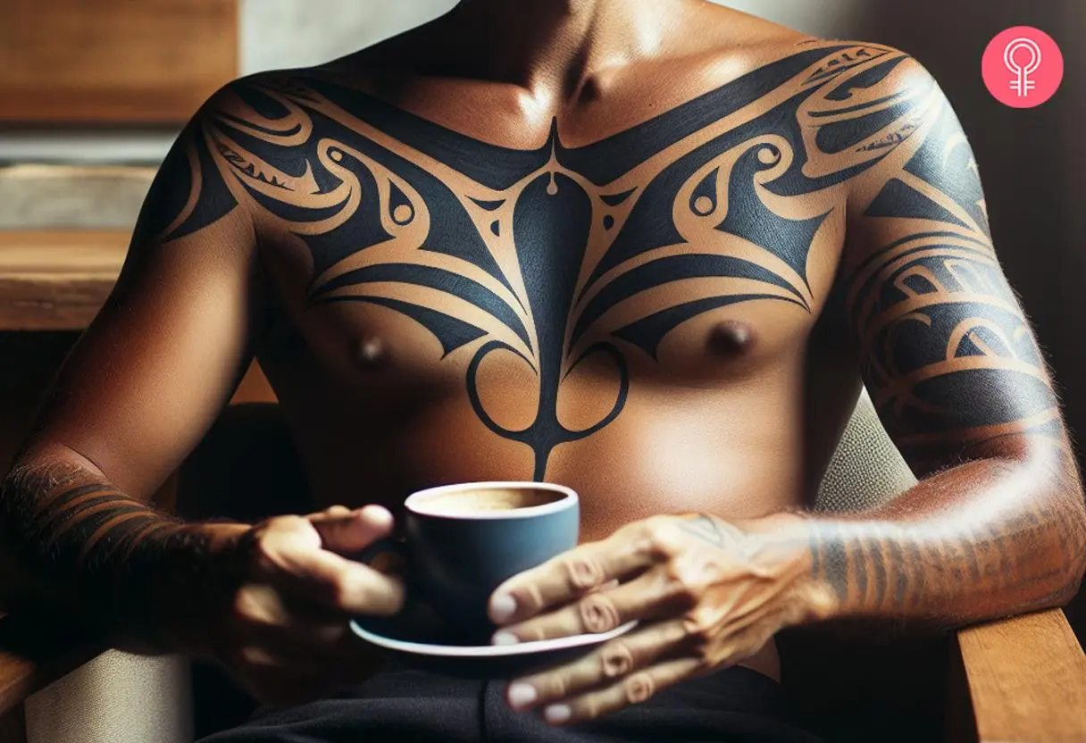 A tribal manta ray tattoo on a man’s chest