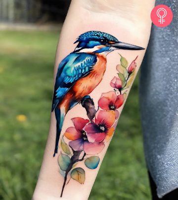 Woman with a parrot tattoo on her arm