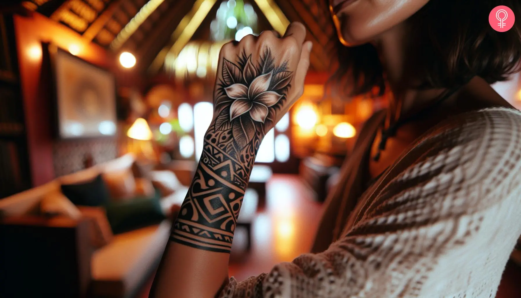 A white Sampaguita flower tattoo on the wrist of a woman