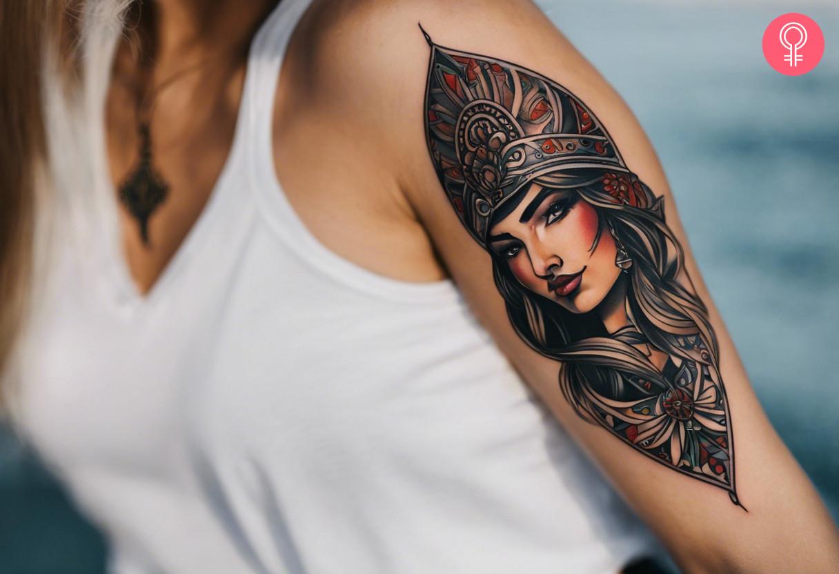 A woman with a Turkish warrior tattoo on her arm