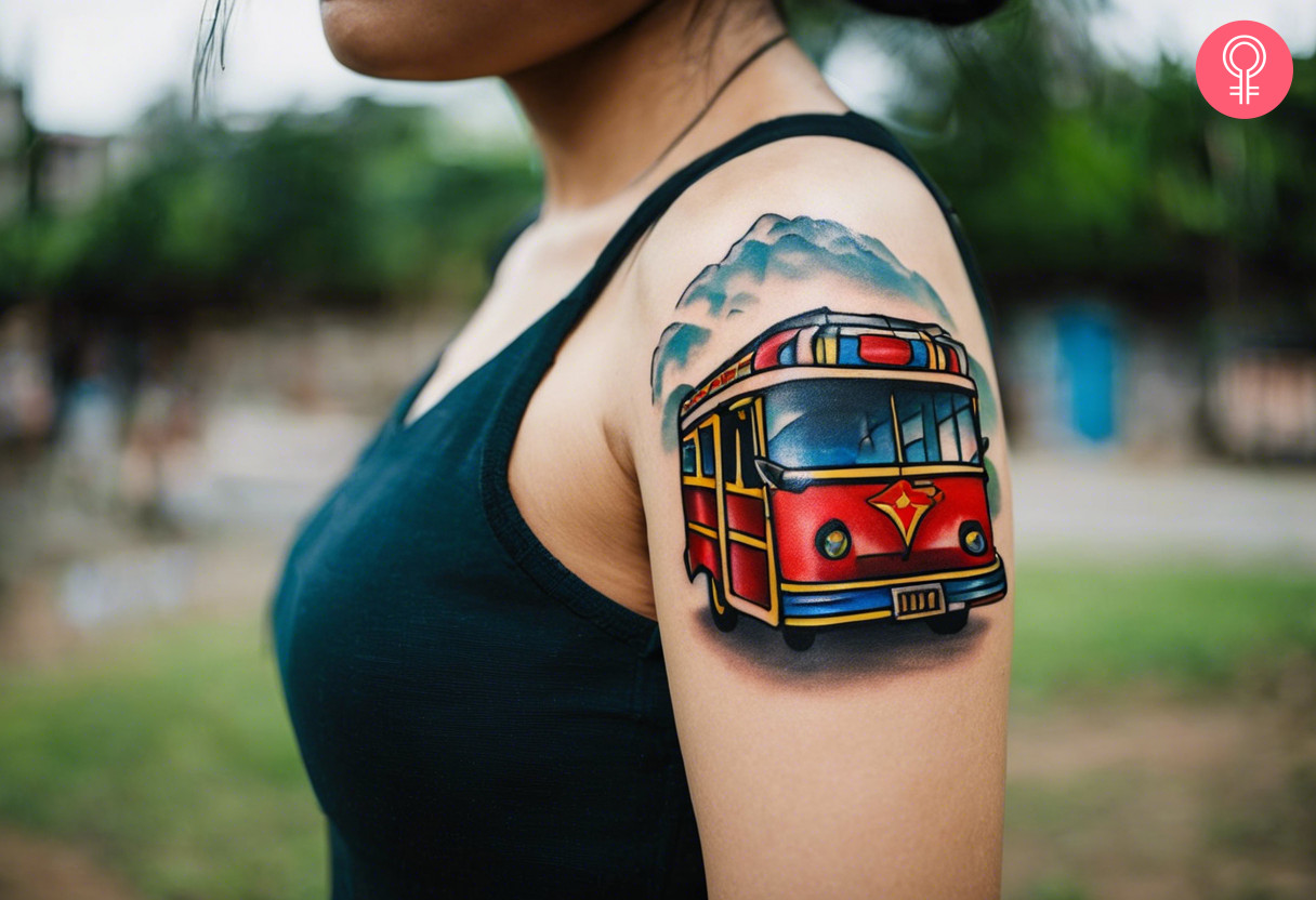 A woman with a colorful jeepney tattoo on her upper arm