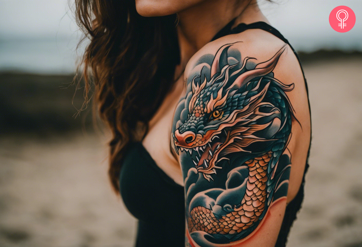 A woman with a fierce dragon tattoo on her upper arm