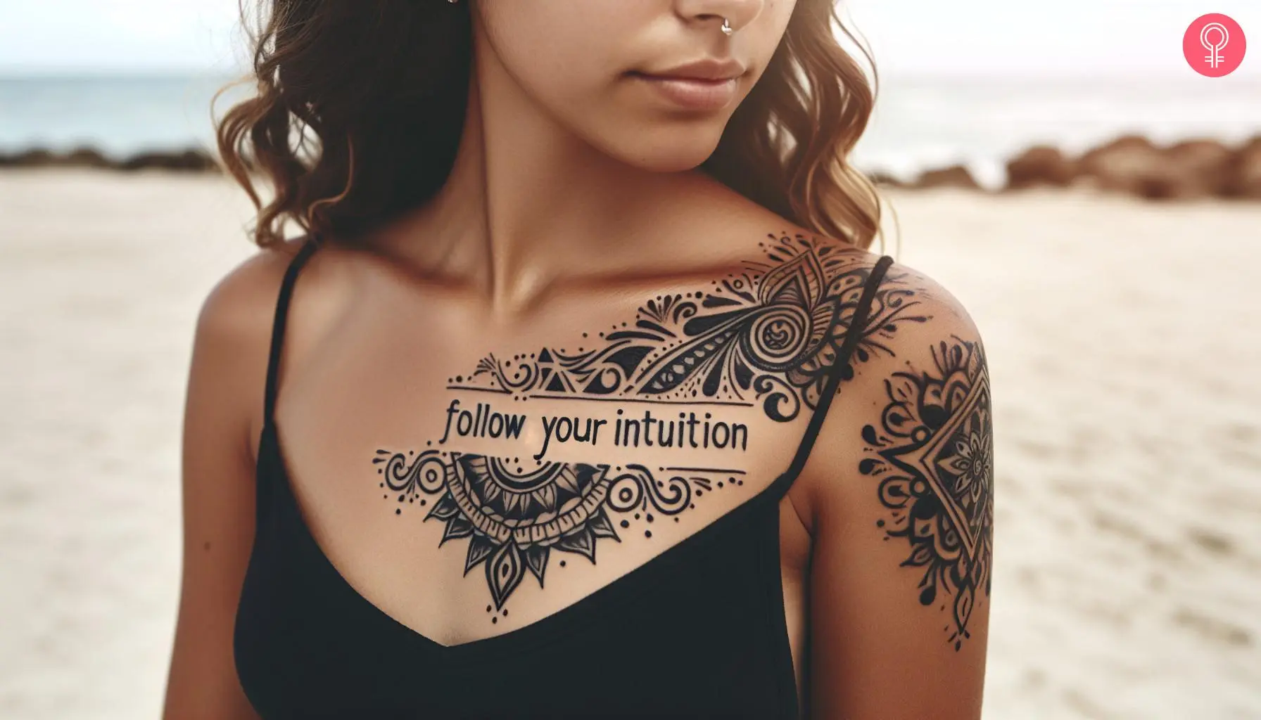 A woman with a follow your intuition tattoo on her chest