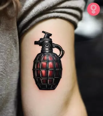 Wear your resilience on your sleeve with grenade-inspired ink. 