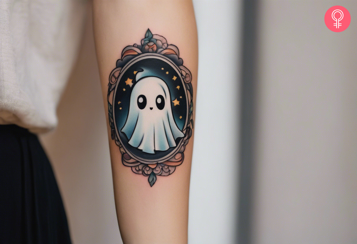 A woman with a minimalist cute cartoon ghost tattoo on her forearm