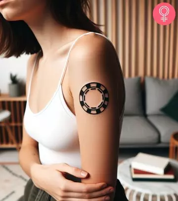 A four-leaf clover good luck tattoo on the arm