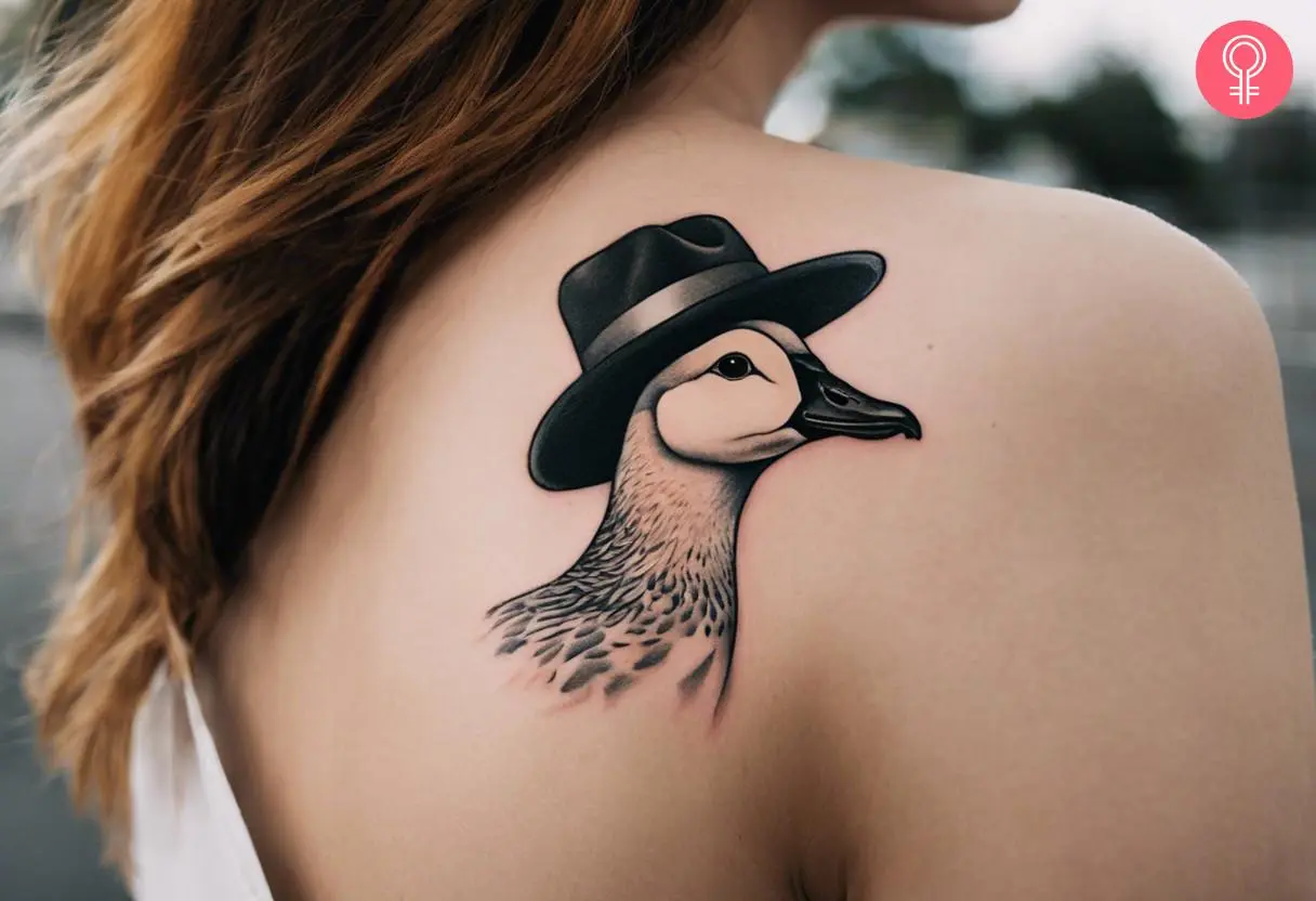 A woman with a silly goose tattoo on her shoulder