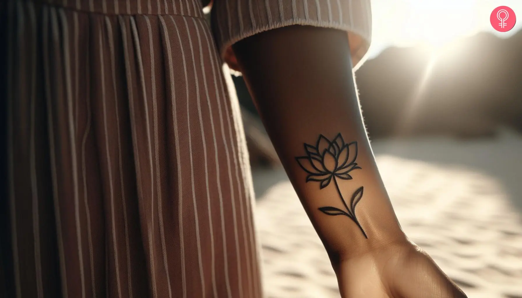 A woman with a spiritual lotus intuition tattoo on her wrist