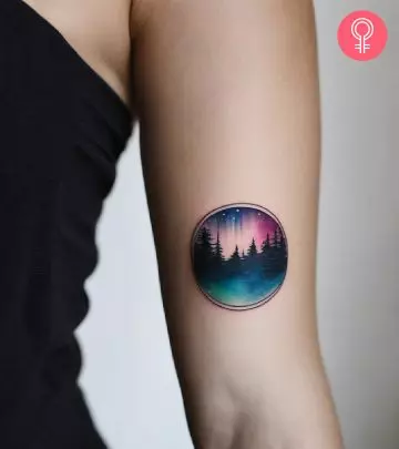 Aurora tattoo on the upper arm