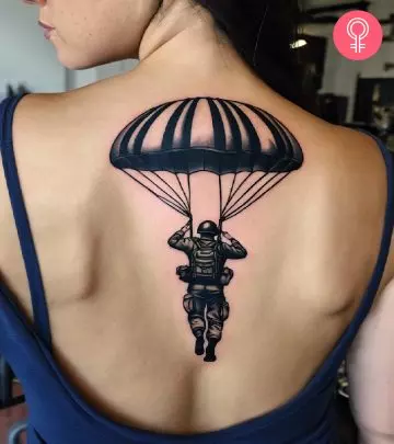 An army tattoo on the arm of a woman