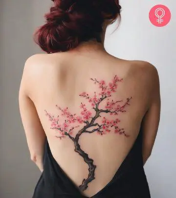 A woman with a classy feminine lower back tattoo