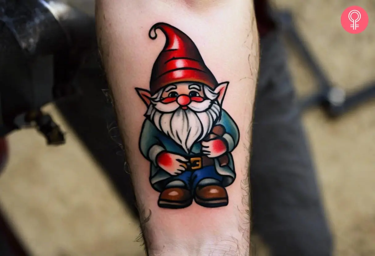 An American traditional gnome tattoo on the forearm