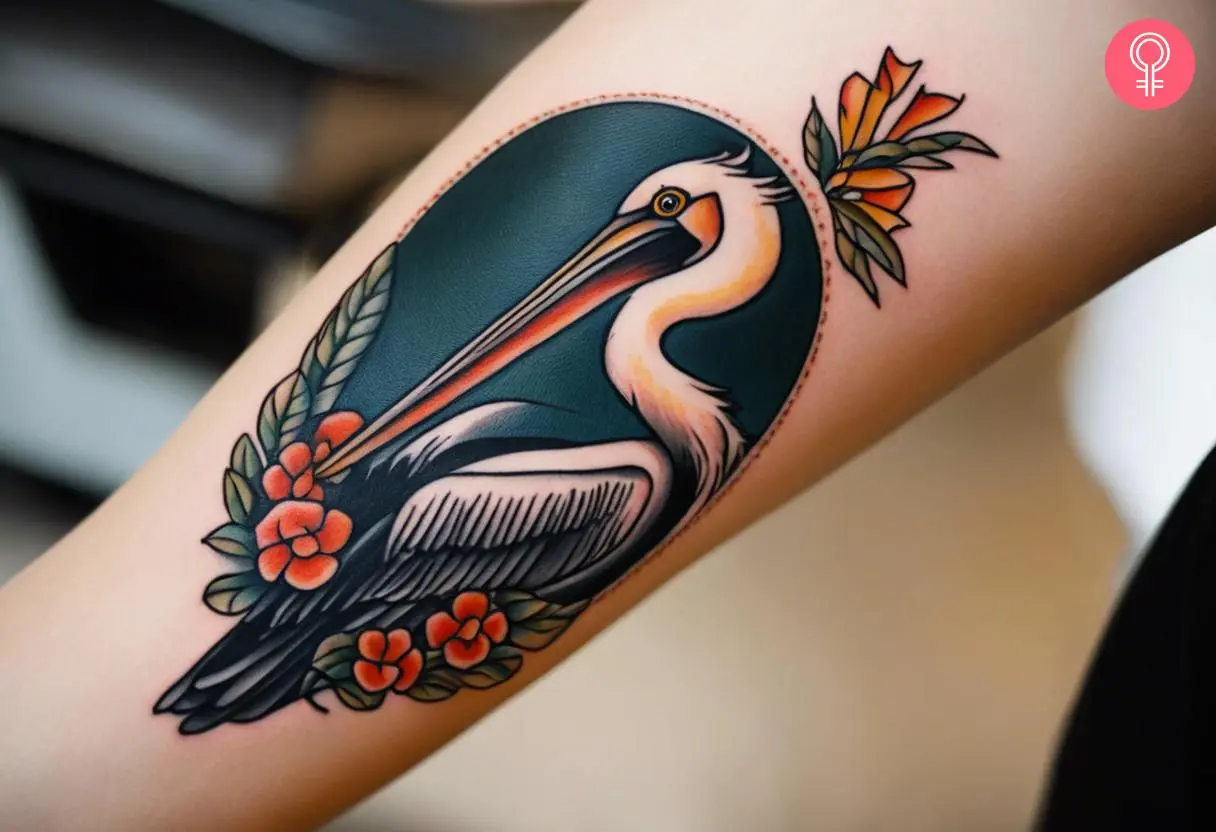 A colorful Pelican tattoo on the forearm