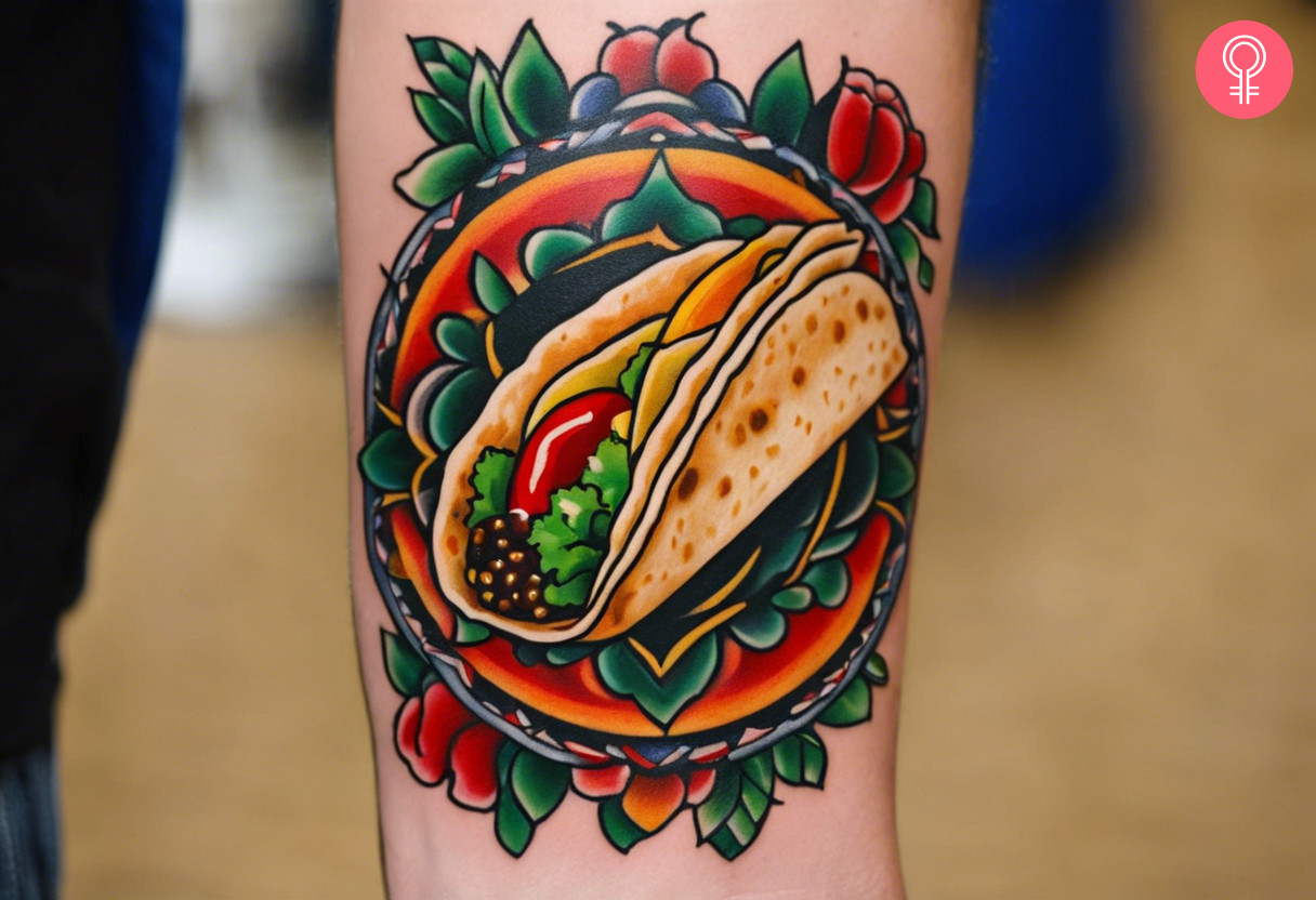 A colorful American traditional taco tattoo on the forearm