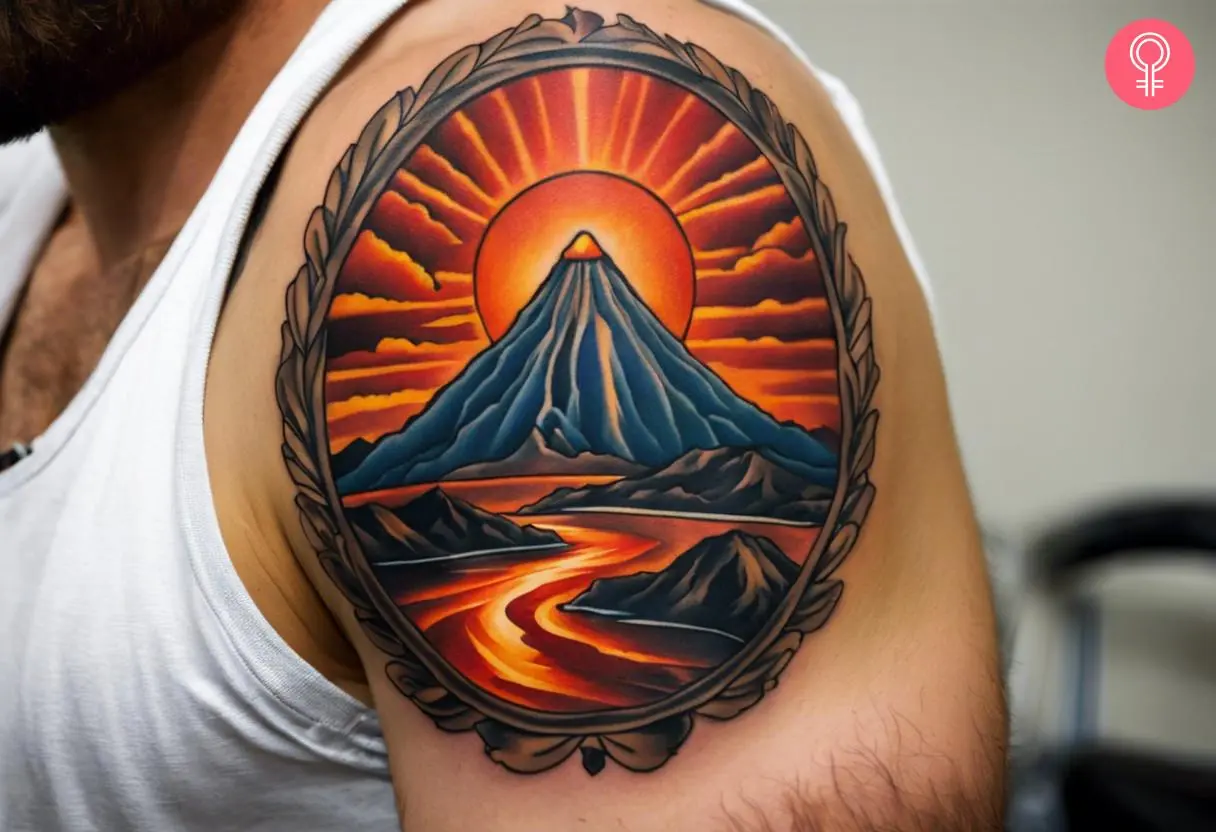 A man wearing an American traditional volcano tattoo on the upper arm