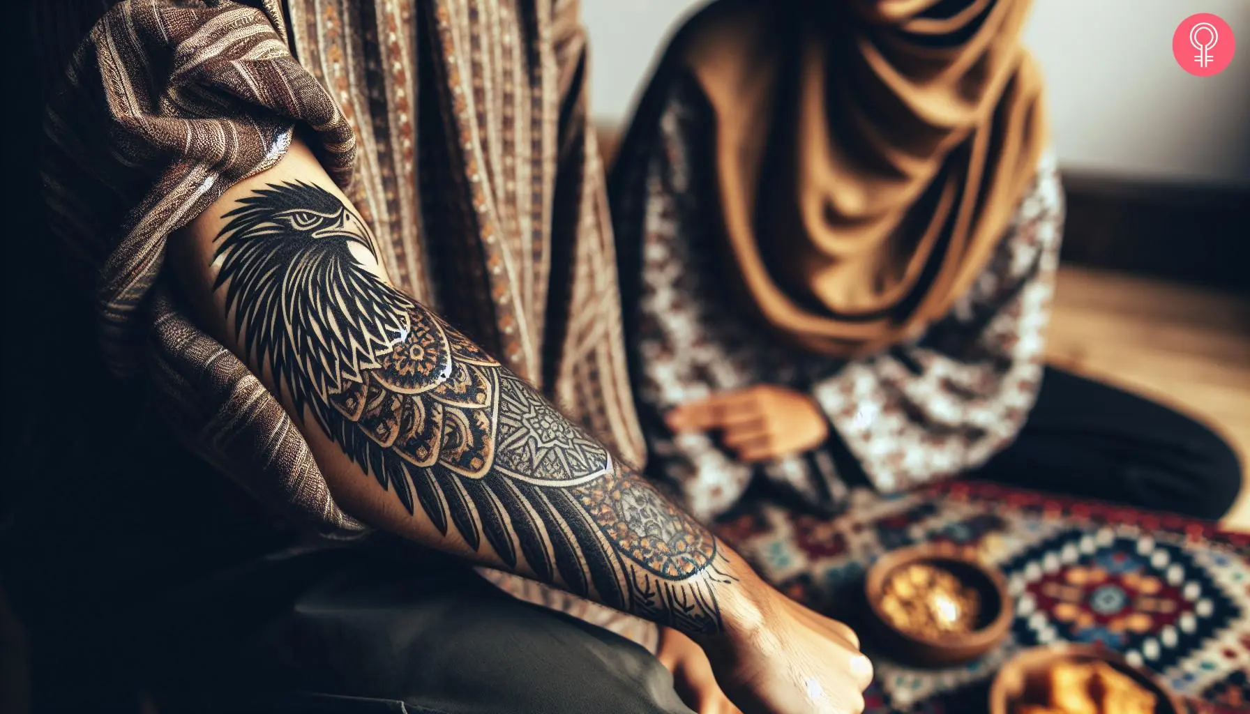 An eagle tattoo on the woman’s forearm