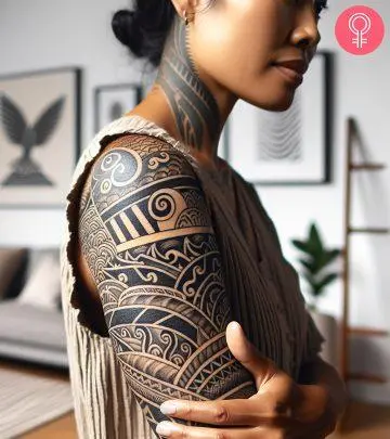 Woman with chair tattoo on her arm